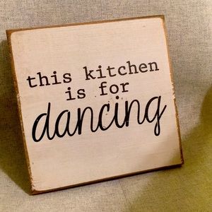 “This kitchen is for dancing” wooden sign